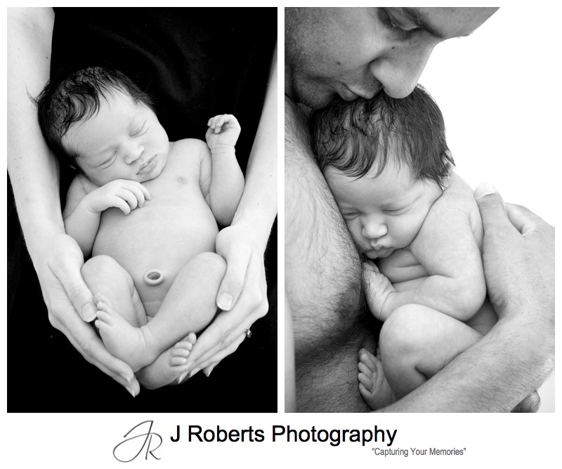 Newborn baby portraits in fathers arms - newborn baby portrait photography sydney